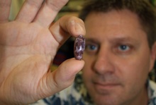 Jon-Paul Bingham holding cone snail